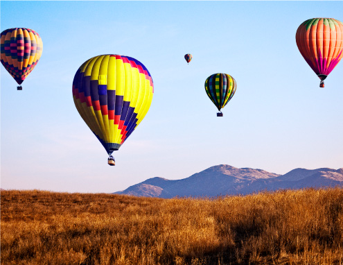 Hot air Balloons Flying over Skinner Lake in Temecula California